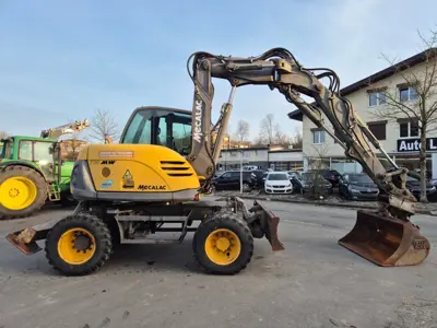 Pneubagger Mecalac 714 MW