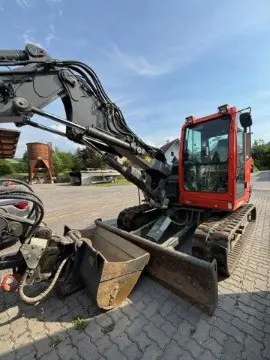 61adde51-a05b-45d2-bdd8-f6439d951236-Bagger Kubota A4.jpg