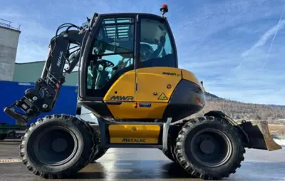 Mecalac 7MWR + Powertilt + Accessoires