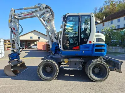 Mobilbagger TAKEUCHI TB395W mit 4-Rad-Lenkung