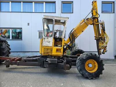 Menzi Muck 5000 T1.5 mit Schwenklöffel und Tiefl.